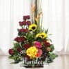 Arreglo Floral con Rosas, girasoles y aves del paraíso