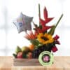 Arreglo Floral con Frutas, Rosas Rosadas y girasol