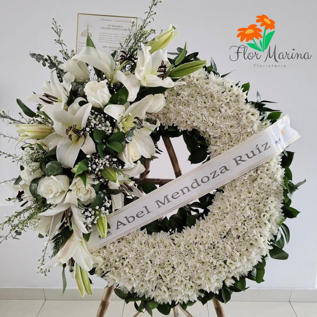 Corona fúnebre con lirios y margaritas